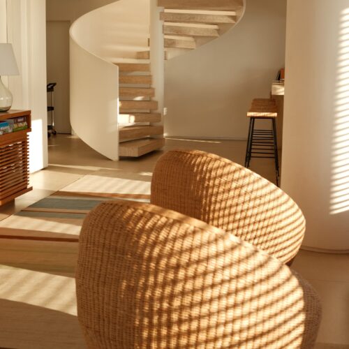 Stylish spiral staircase in a sunny Janeiro hotel lounge