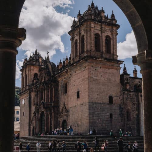 Cusco Cathedral appearing thorough an archway